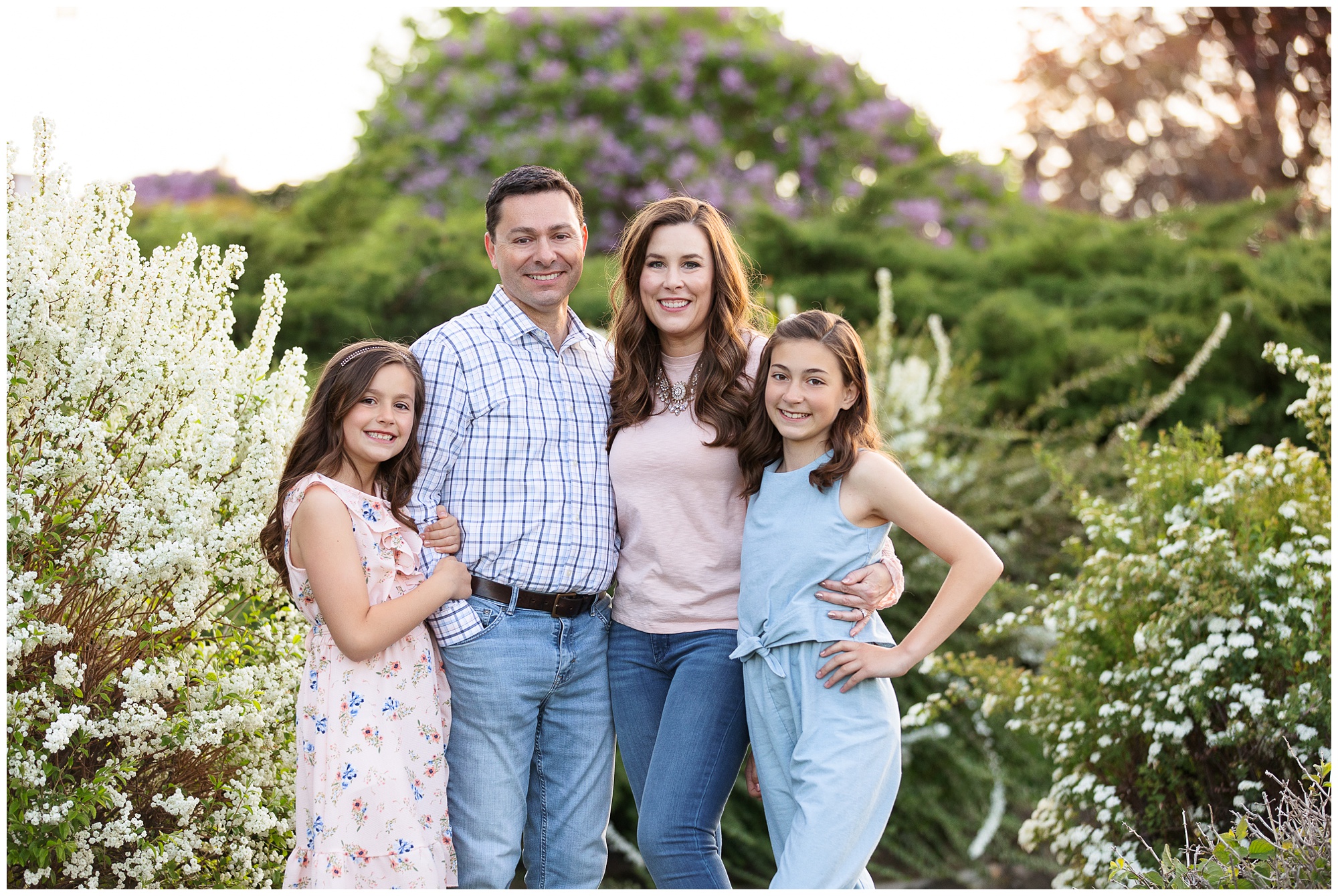 Family of four poses among the Boise Depot wildflowers. Photos by Tiffany Hix Photography.