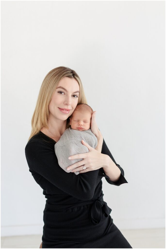 mom holding newborn baby