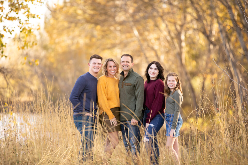 A family of 5 along the Boise river for family pictures.