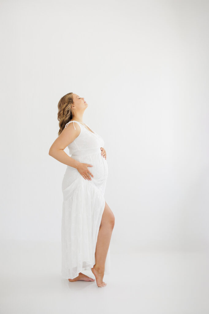 Studio maternity photos in Boise Idaho with glowing mom-to-be