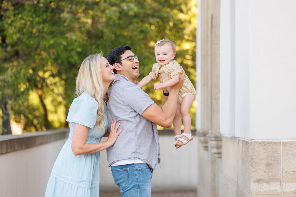 A family of 3 standing at the Boise Depot.